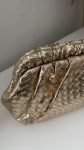 Bolso trenzado dorado