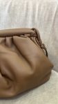 Bolso de mano con bandolera