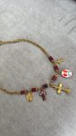 Collar charms cruz