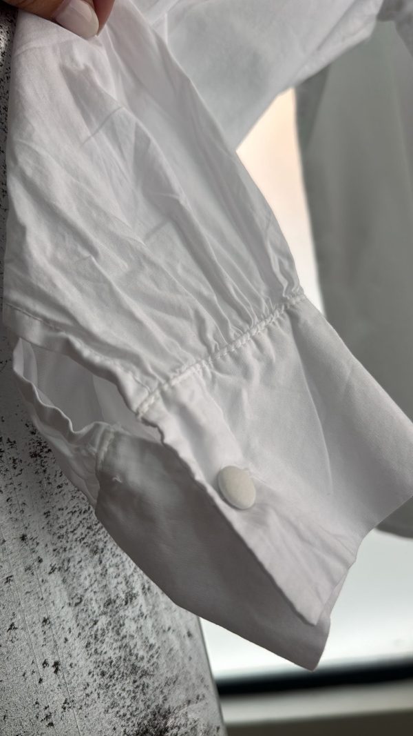 Blusa lisa abotonada