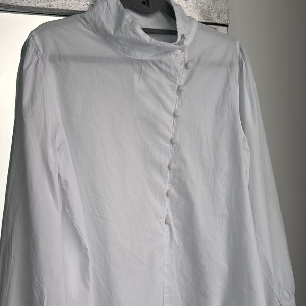 Blusa lisa abotonada