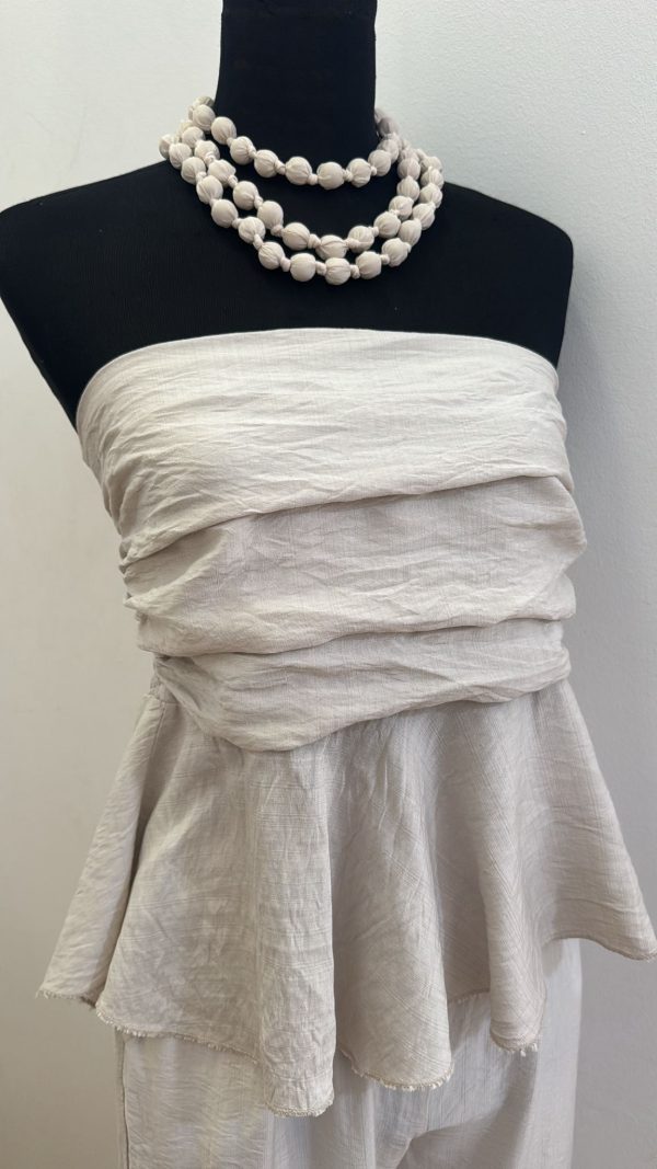 Conjunto peplum beige